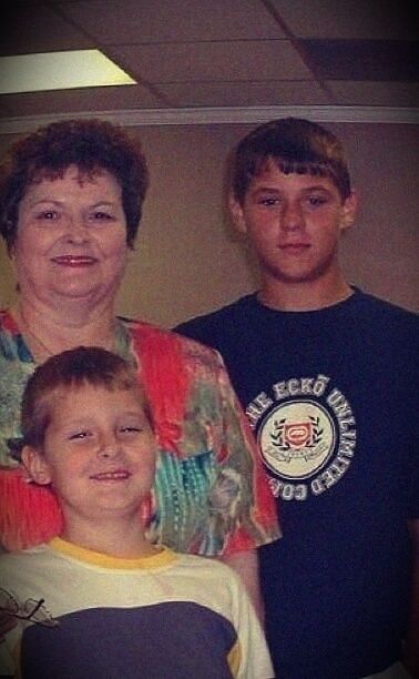 A young Dustin Poirier (right) with his family