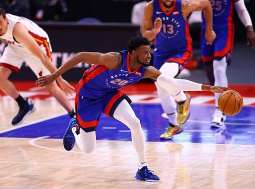 Josh Jackson (#20) of the Detroit Pistons grabs a loose ball.