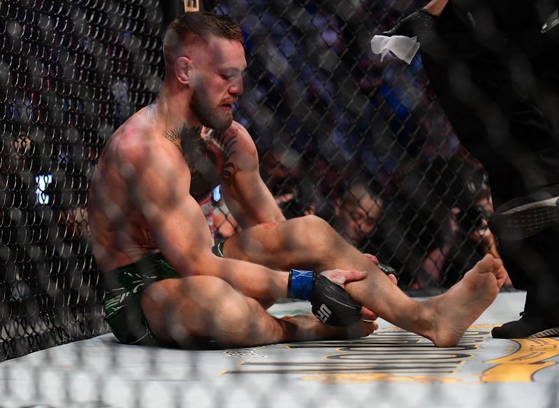 Conor McGregor nursing his broken leg at UFC 264