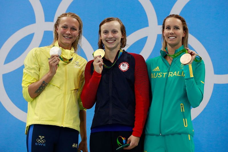 Silver medalist Sarah Sjostrom of Sweden, gold medalist Katie Ledecky of the United States and bronze medalist Emma McKeon of Australia pose on the podium during the medal ceremony for the Women&#039;s 200m Freestyle Final on Day 4 of the Rio 2016 Olympic Games