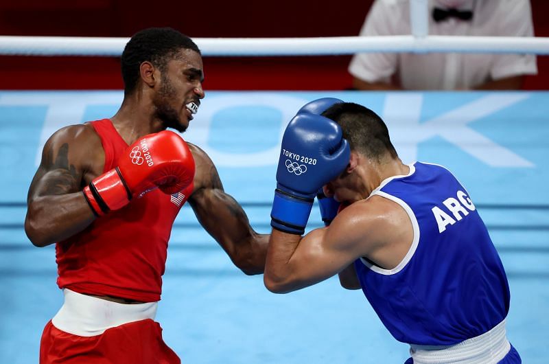 Delante Johnson (red) in action at Day 1 of Olympics