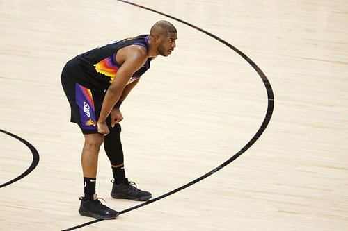 Chris Paul takes a breather on the court in Game 2 of the 2021 NBA Finals.