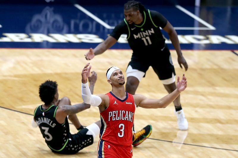 Josh Hart #3 of the New Orleans Pelicans reacts after being call for the foul on Jaden McDaniels #3 of the Minnesota Timberwolves