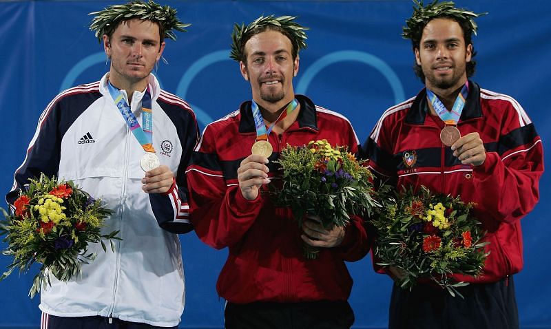 Mardy Fish (L), Nicolas Massu and Fernando Gonzalez (R) at the Athens Olympics medal ceremony