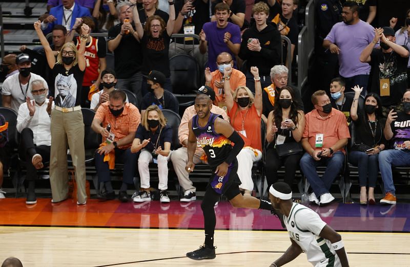 Chris Paul #3 celebrates a basket.