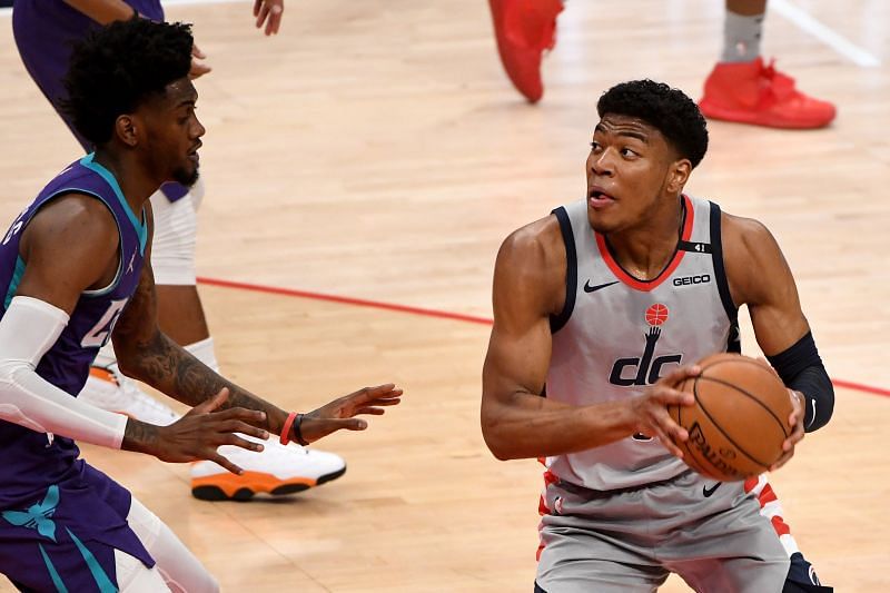 Rui Hachimura (#8) of the Washington Wizards looks to shoot in front of Jalen McDaniels (#6) of the Charlotte Hornets