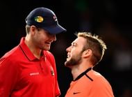 John Isner and Jack Sock embrace at the net
