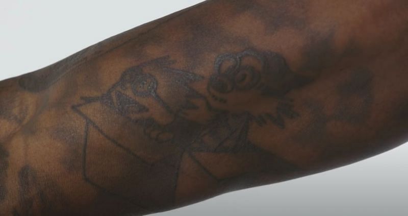 Israel Adesanya tattoos meaning number location  dedication