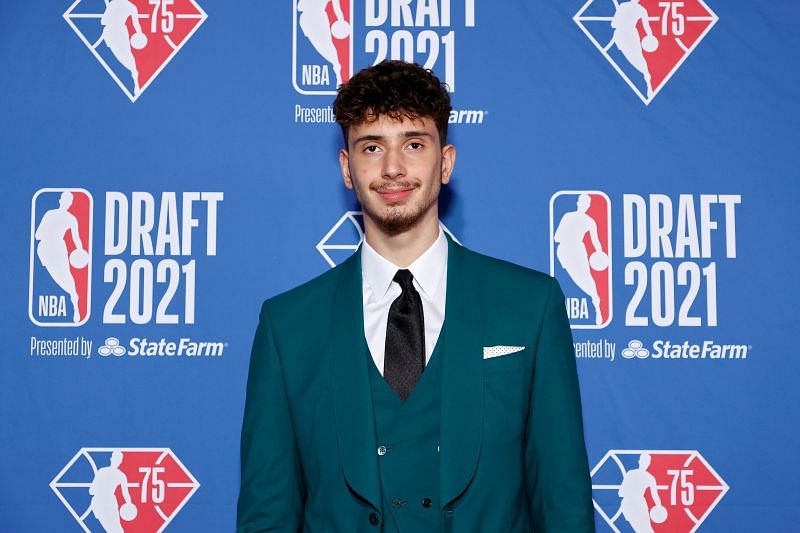 Alperen Sengun poses after being drafted to the Houston Rockets
