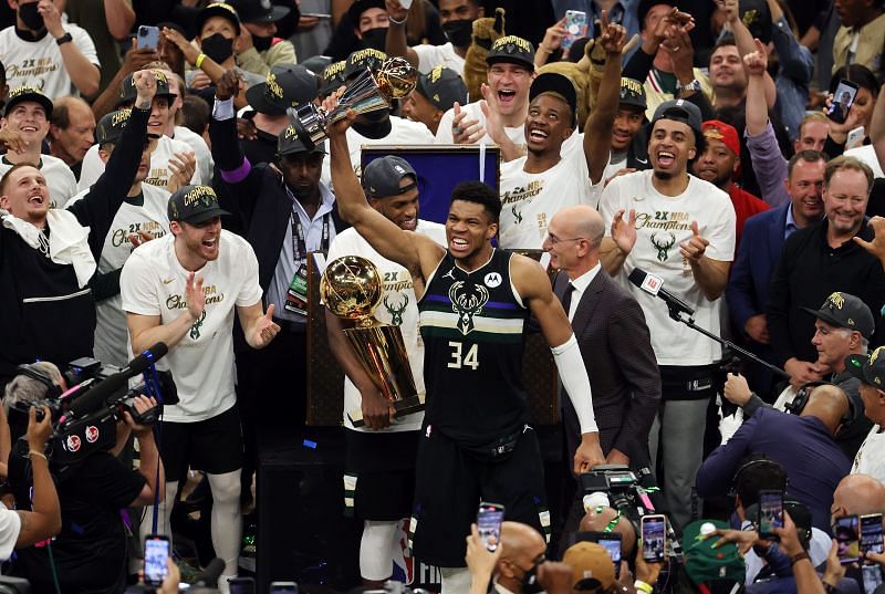 Giannis Antetokounmpo #34 celebrates winning the Bill Russell NBA Finals MVP Award.