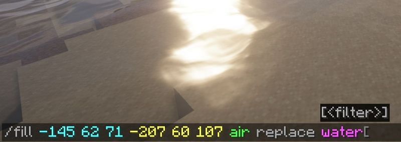 Il comando che sostituisce l'acqua con l'aria nella versione Java (Immagine tramite Minecraft)