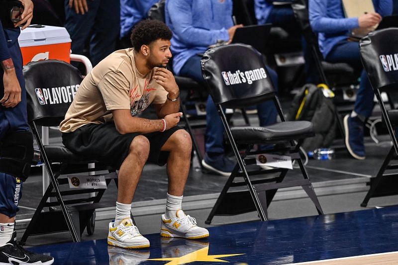 Jamal Murray #27 of the Denver Nuggets watches the action from the bench area in Game Three of the Western Conference second-round playoff series