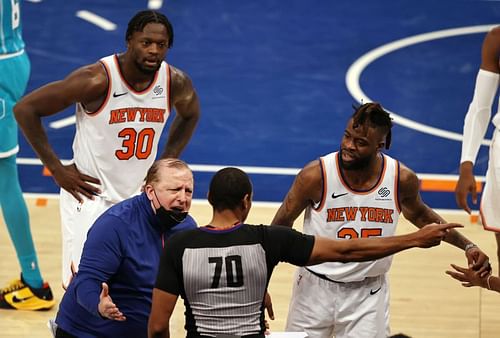 Tom Thibodeau reacts after the ball is given to the Charlotte Hornets as Julius Randle #30 and Reggie Bullock #25 also respond.