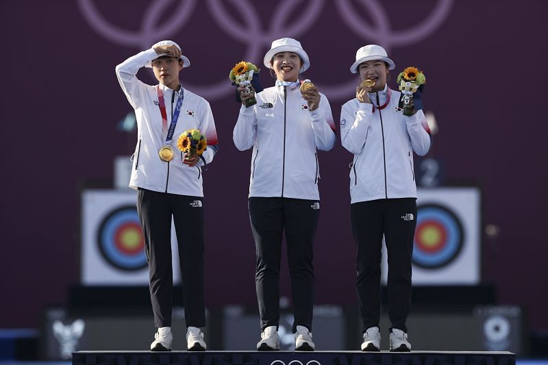 San An, Minhee Jang, and Chaeyoung Kang of Team South Korea pose with their gold medals at Tokyo Olympics 2020