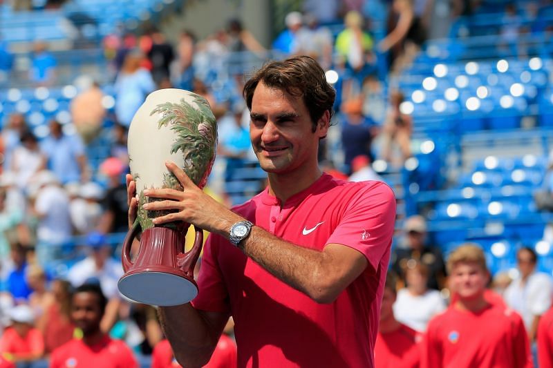 Roger Federer holds up the trophy after defeating Novak Djokovic to win the Western &amp; Southern Open at the Linder Family Tennis Center in August, 2015 in Cincinnati, Ohio