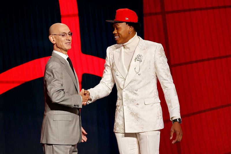 Scottie Barnes (right) is greeted by NBA commissioner Adam Silver