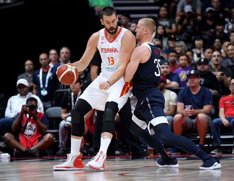 Marc Gasol (#12) of Spain post up on Mason Plumlee (#35) of the United States.