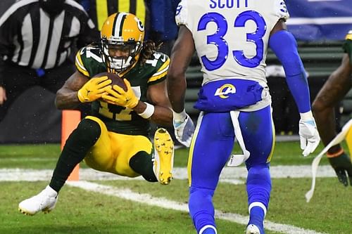 Davante Adams catching a TD against the Los Angeles Rams in the divisional round of the 2020 playoffs. The Packers defeated LA, 32-18, on route to their second straight NFC Championship game. (credit: LA Times)