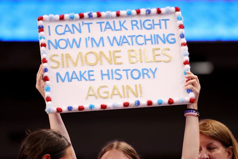 A fan holds a sign at recently-concluded US Olympic Trials