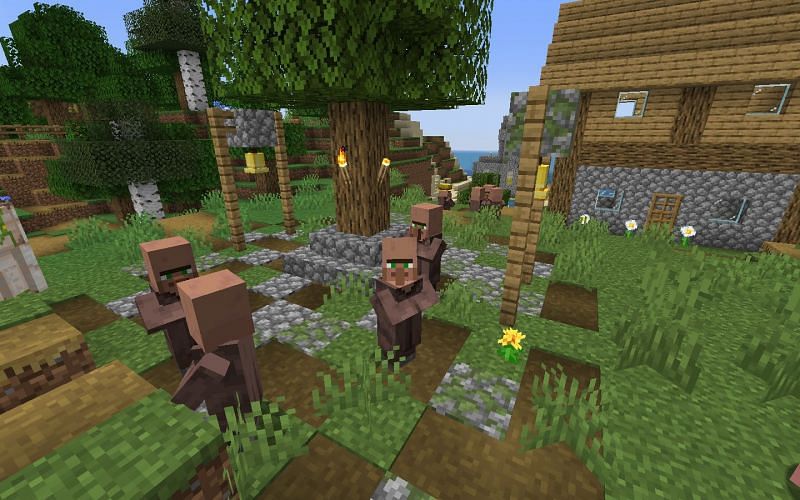 Multiple villagers gathering together (Image via Minecraft)