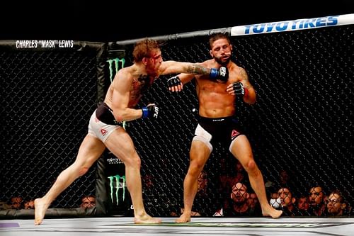 Conor McGregor (left) vs. Chad Mendes (right) at UFC 189