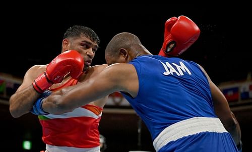 Satish Kumar (in red) will take on the formidable Bakhodir Jalolov on Sunday