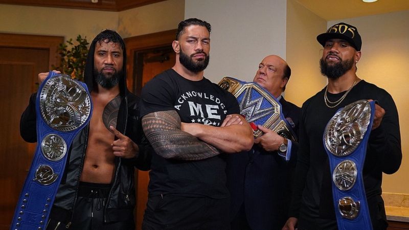 Roman Reigns with The Usos and Paul Heyman