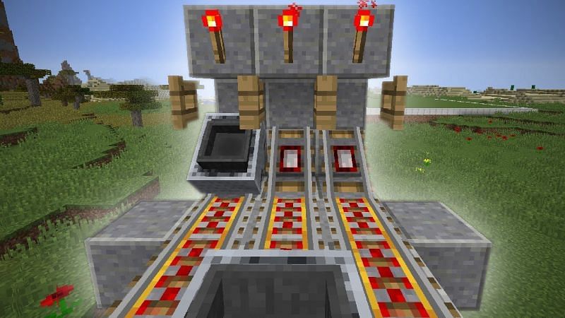 A player creates a minecart unloader using detector rails, powered rails, and minecarts with hoppers (Image via ThirtyVirus on YouTube)