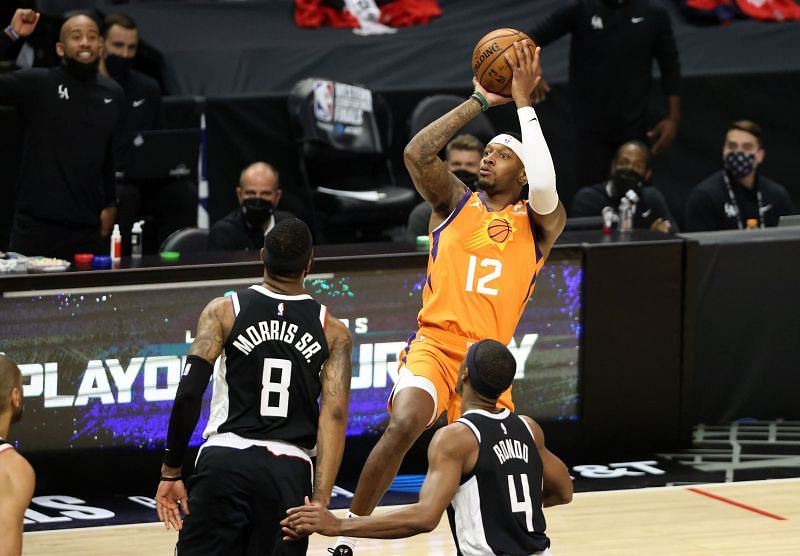 Torrey Craig #12 of the Phoenix Suns attempts a shot