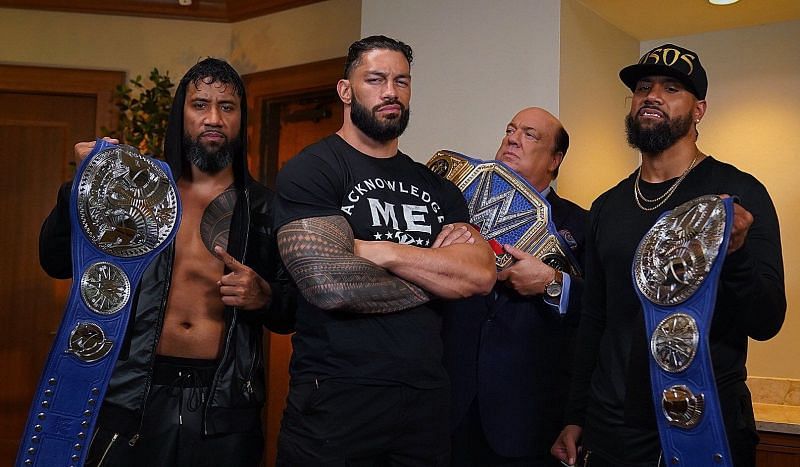 Roman Reigns with The Usos and Paul Heyman