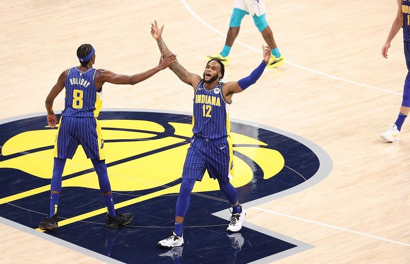 Indiana Pacers players react during a game against the Charlotte Hornets