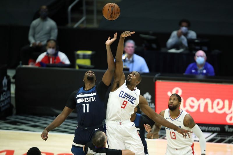 Minnesota Timberwolves center Naz Reid goes up for tip-off