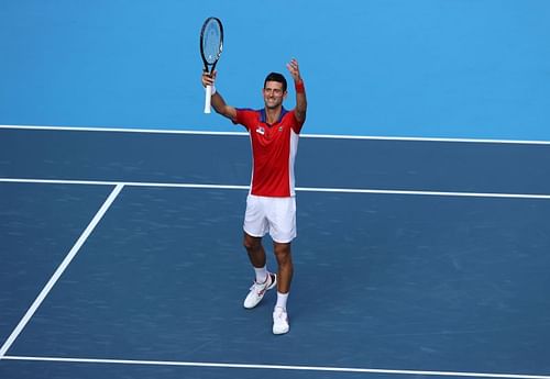 Novak Djokovic celebrates his first round victory against Bolivia's Hugo Dellien