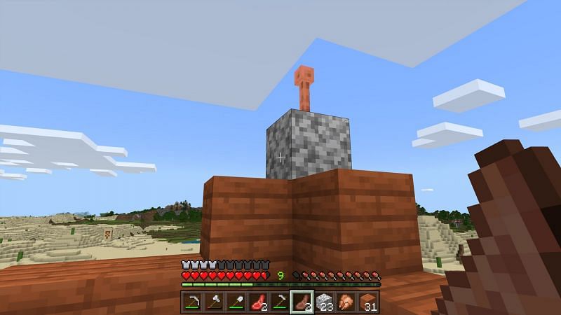Lightning rods can be a huge boon for Minecraft players who enjoy building structures from more flammable materials (Image via Mojang)
