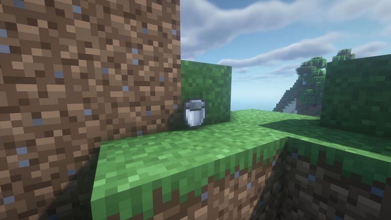 An empty bucket (Image via Minecraft)