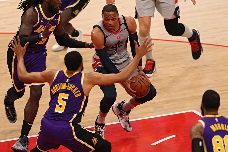 Russell Westbrook #4 looks to pass in front of Talen Horton-Tucker #5