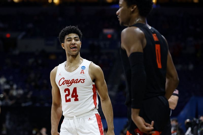 Quentin Grimes #24 of the Houston Cougars speaks to Gianni Hunt #0.