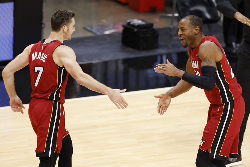 Goran Dragic #7 and Andre Iguodala #28 of the Miami Heat celebrate against the New Orleans Pelicans