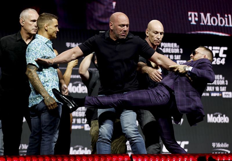 Dustin Poirier (left), Dana White (center), and Conor McGregor (right) at the UFC 264 press conference [Image Credit: Thomas King / Sportsfile via Getty Images]