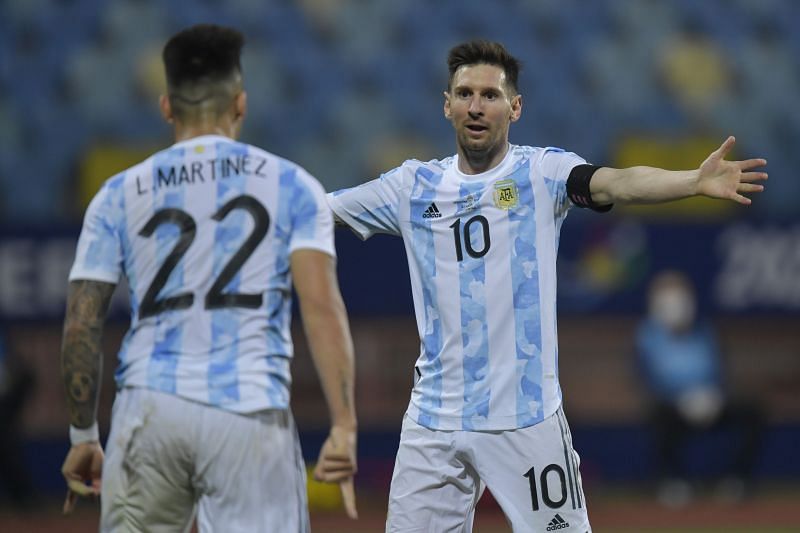 Lionel Messi celebrates with Lautaro Martinez