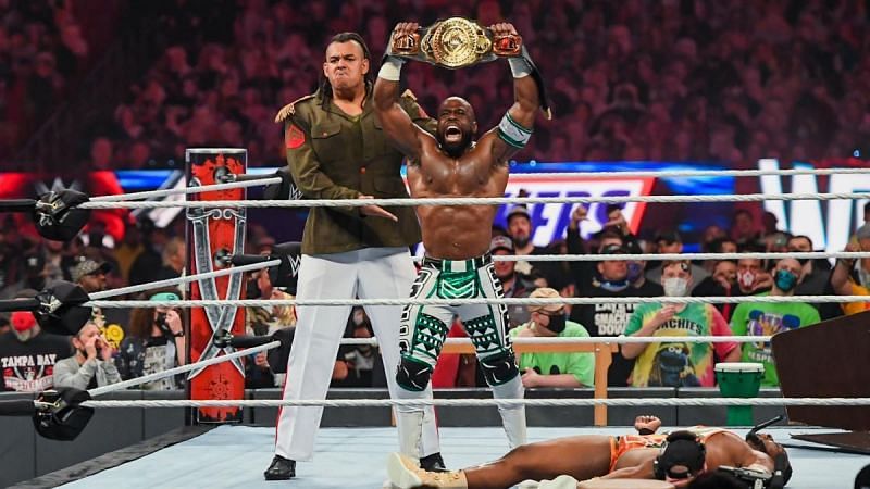 WWE Intercontinental Champion Apollo Crews posing with Commander Azeez