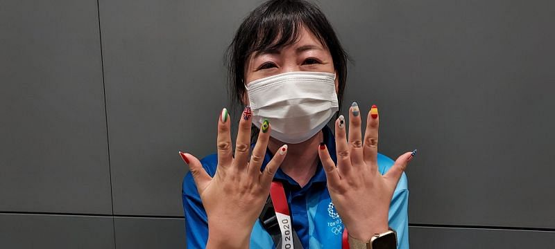 Akiko Ichimori painted flags of different countries on her finger nails