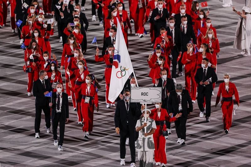 Russian athletes marching into Tokyo Olympics opening ceremony with Russia Olympic Committee flag (twitter @Olympic_Russia)