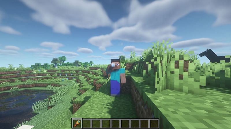 Steve using a spyglass in the game (Image via Minecraft)