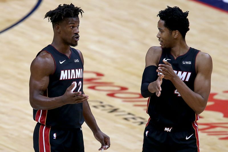 Jimmy Butler #22 and KZ Okpala #4 of the Miami Heat