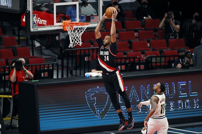 Norman Powell #24 of the Portland Trail Blazers dunks against the Denver Nuggets