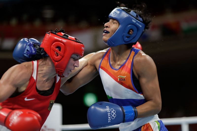 Nadine Apetz (red) of Germany exchanges punches with Lovlina Borgohain of India during the Women&#039;s Welter (64-69kg) on day four of Olympics 2021