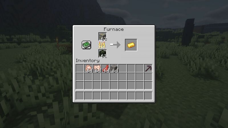 Smelting gold in a furnace (Image via Minecraft)