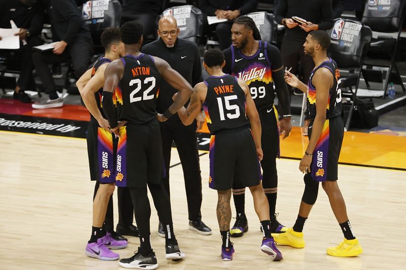 Suns head coach Monty Williams speaks to his team