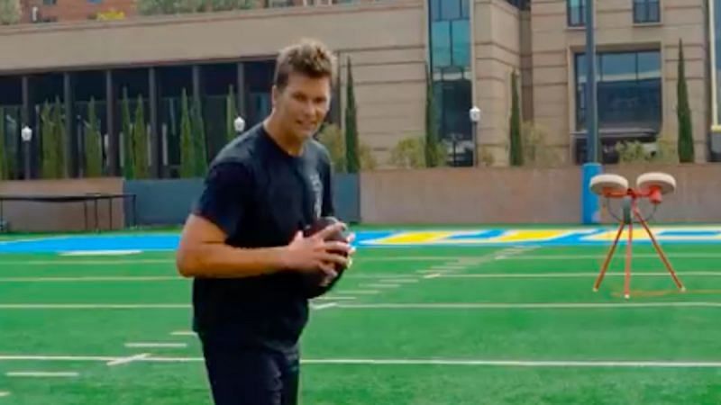 Tom Brady tossing footballs into a jug machine video